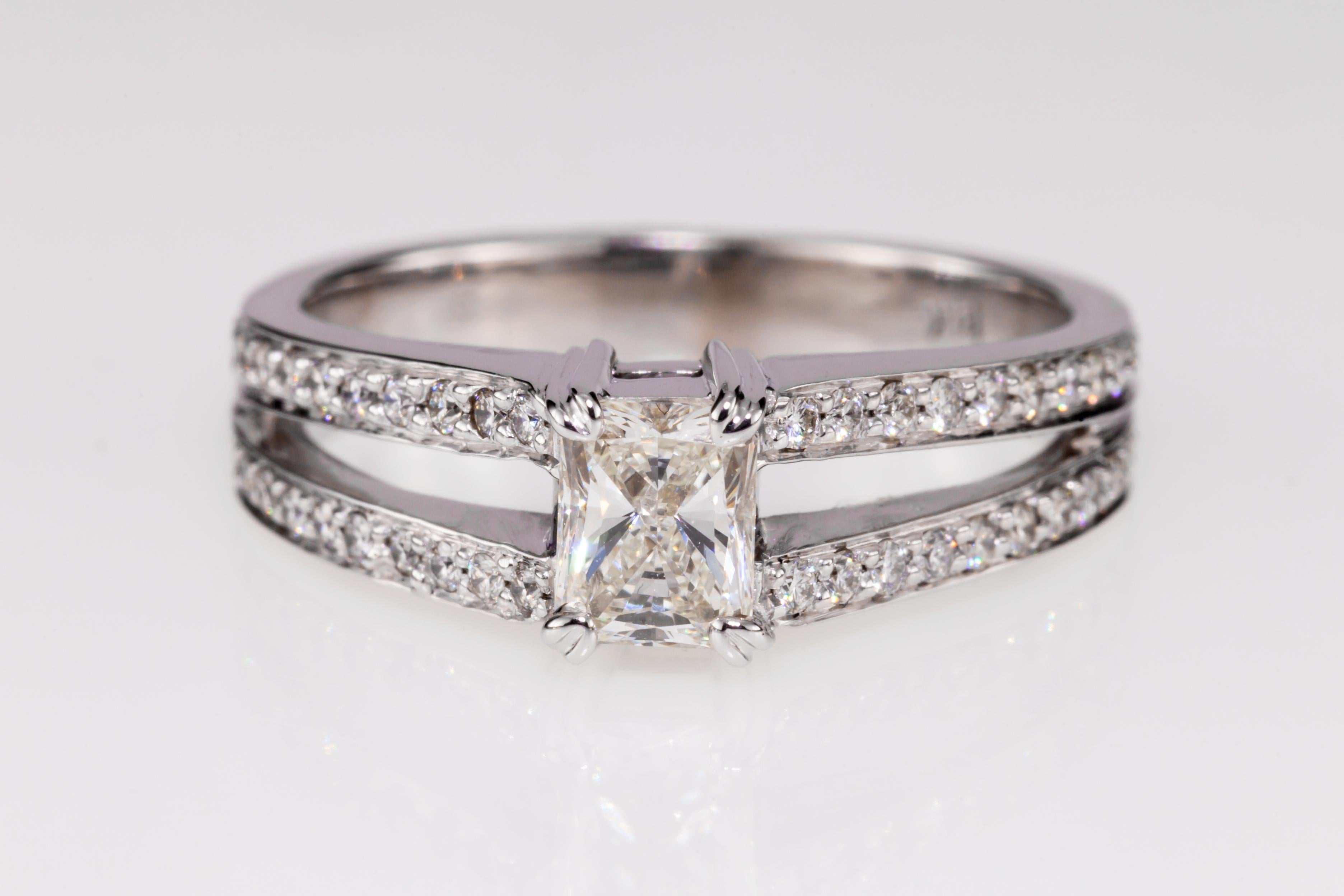 0.53 Carat Radiant Diamond Solitaire Ring with Accent Stones in White Gold 3