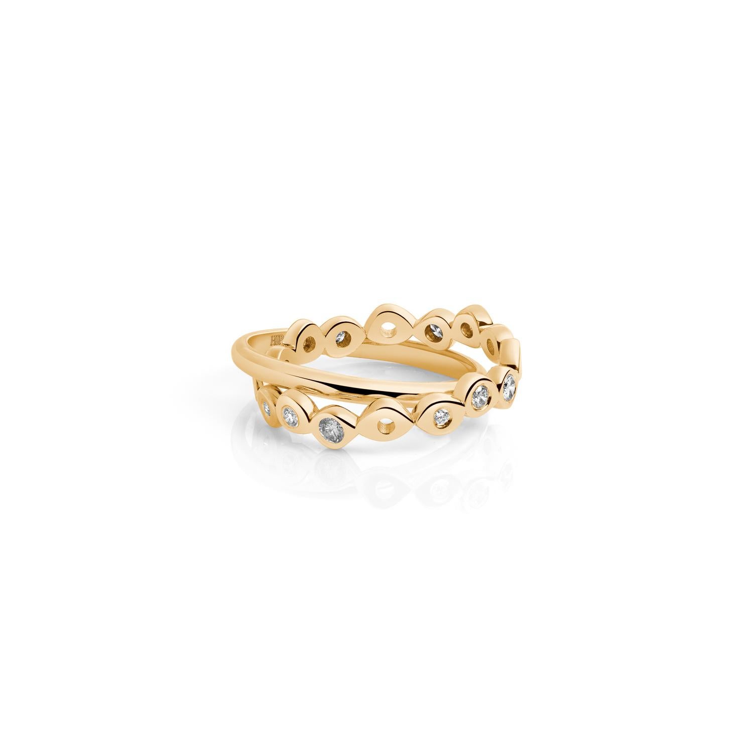 These two rolling ring bands are comfortable, make a statement and work great as alternative wedding bands. Hi June Parker's best selling Shadows ring band has been upgraded with a few more diamonds and connected to a plain half-round ring band for