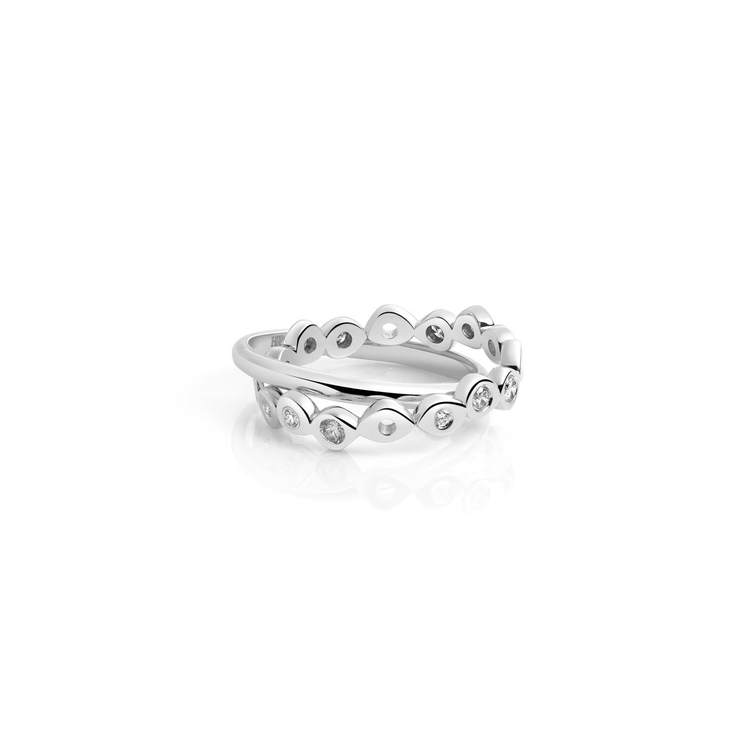 These two rolling ring bands are comfortable, make a statement and work great as alternative wedding bands. Hi June Parker's best selling Shadows ring band has been upgraded with a few more diamonds and connected to a plain half-round ring band for