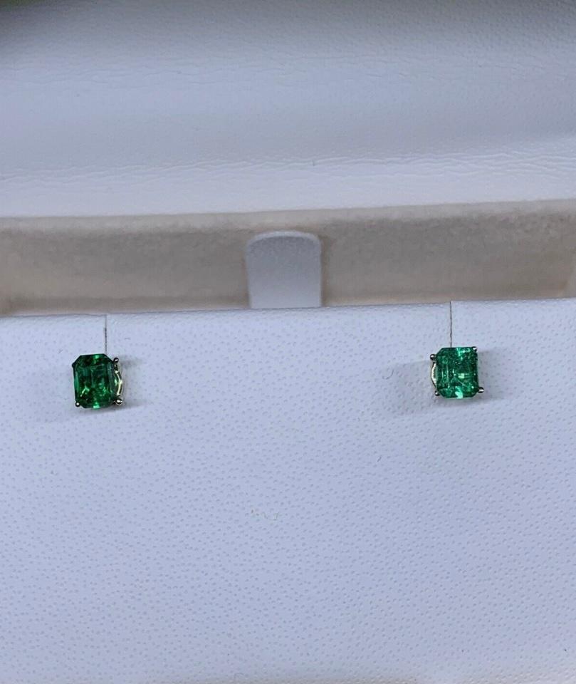 0.53ct Colombian Emerald Solitaire Stud Earrings In 18ct White Gold In New Condition For Sale In London, GB