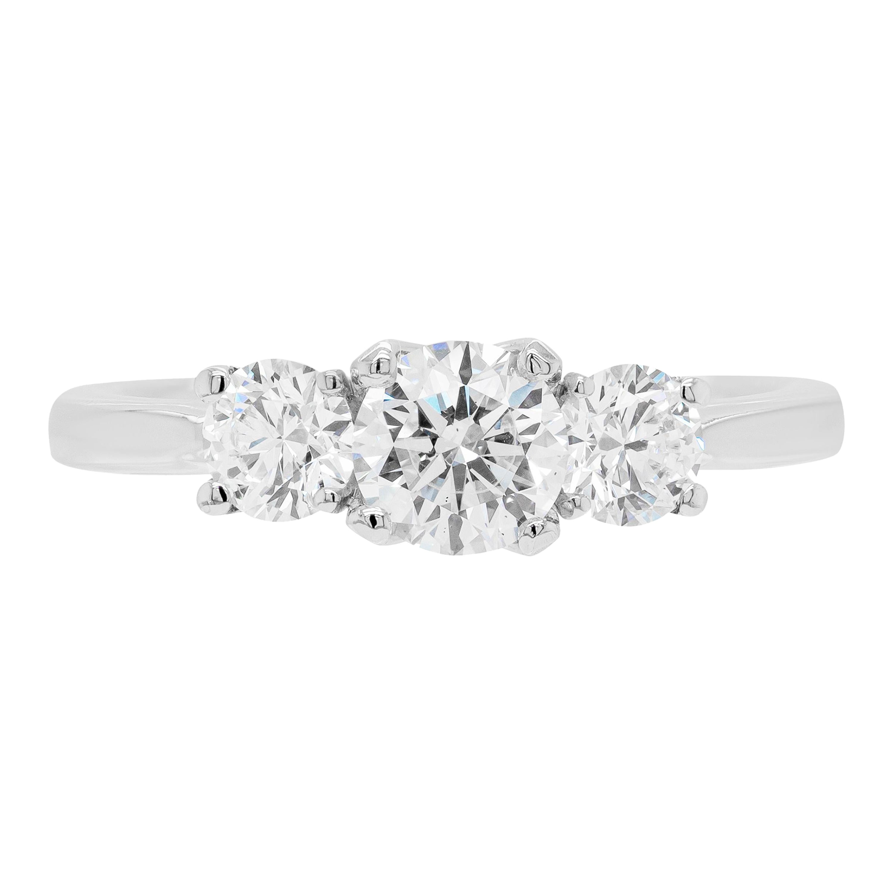 Anello di fidanzamento in platino a tre pietre con diamante E VS2 da 0,53 ct.