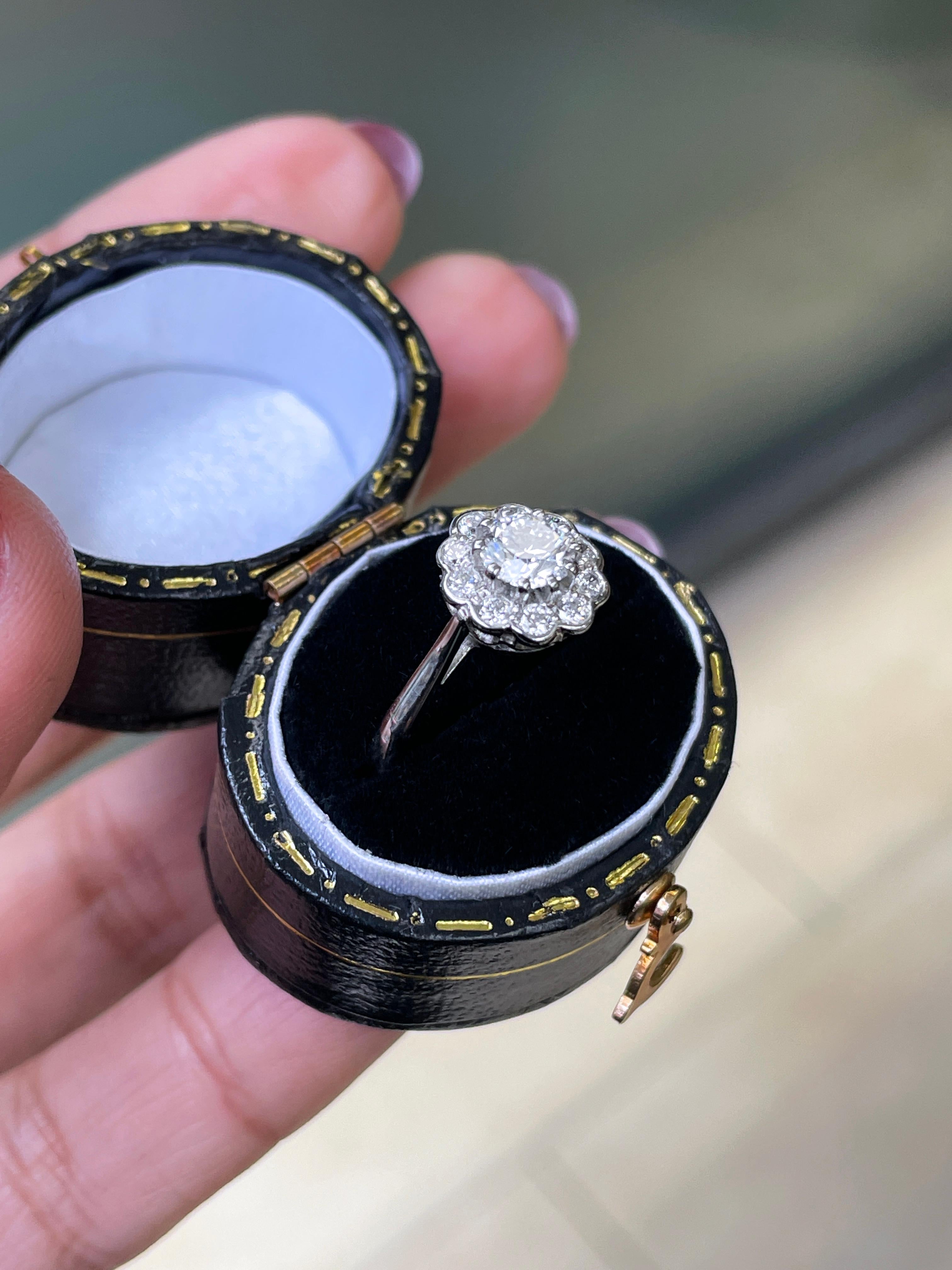 Modern 0.53ct F VS2 Diamond Platinum Daisy Cluster Engagement Ring For Sale