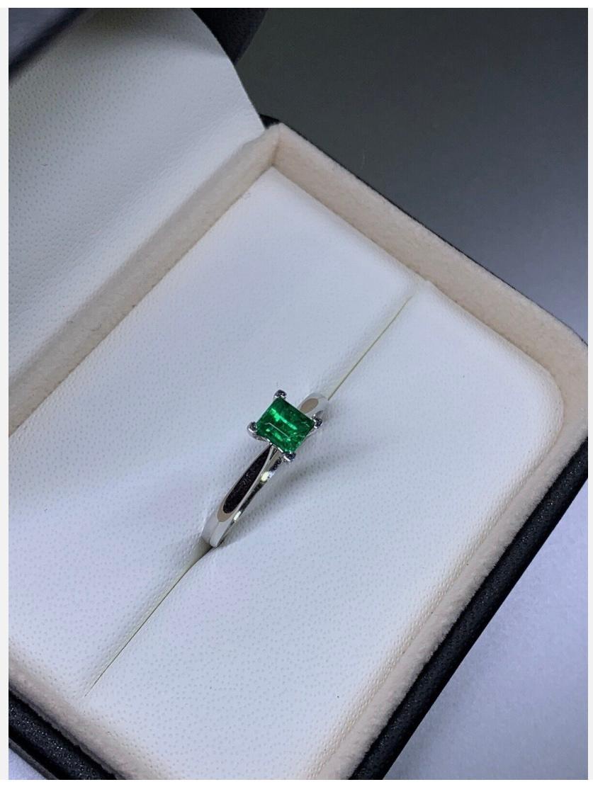 0.53ct Green Emerald Solitaire Engagement Ring In 18ct White Gold In New Condition For Sale In London, GB