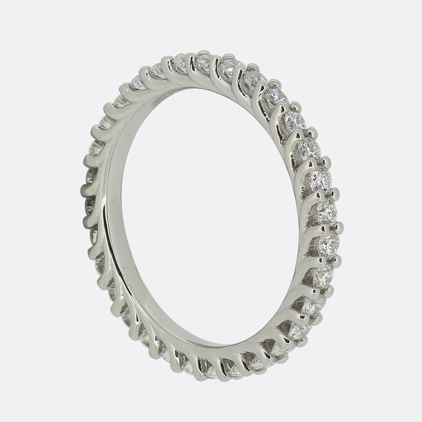Here we have an classically designed, contemporary platinum diamond full eternity ring. The entire band has been set with 30 individually claw set round brilliant cuts diamonds around the outer edge in a single line formation with the under-gallery
