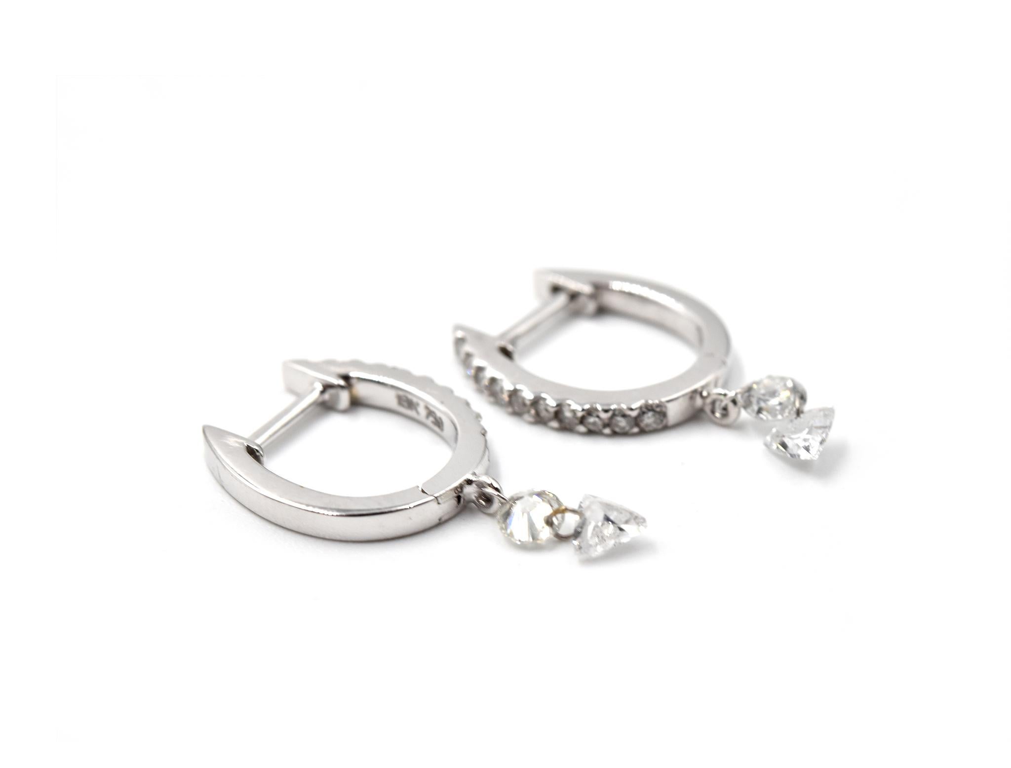 Designer: design personalizzato
Materiale: oro bianco 18 carati
Diamanti: 0,54 carati di peso totale
Colore: G
Chiarezza: VS
Dimensioni: ogni orecchino è lungo 3/4 di pollice
Chiusure: chiusura a scatto
Peso: 2.34 grammi
