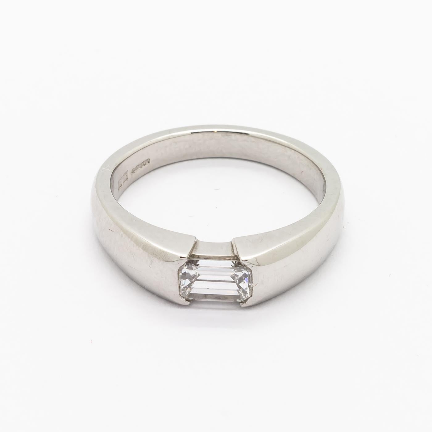 Modern 0.54 Carat Emerald-Cut Diamond Platinum Ring For Sale