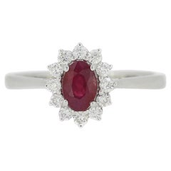Bague grappe de rubis ovales et diamants 0,54 carat