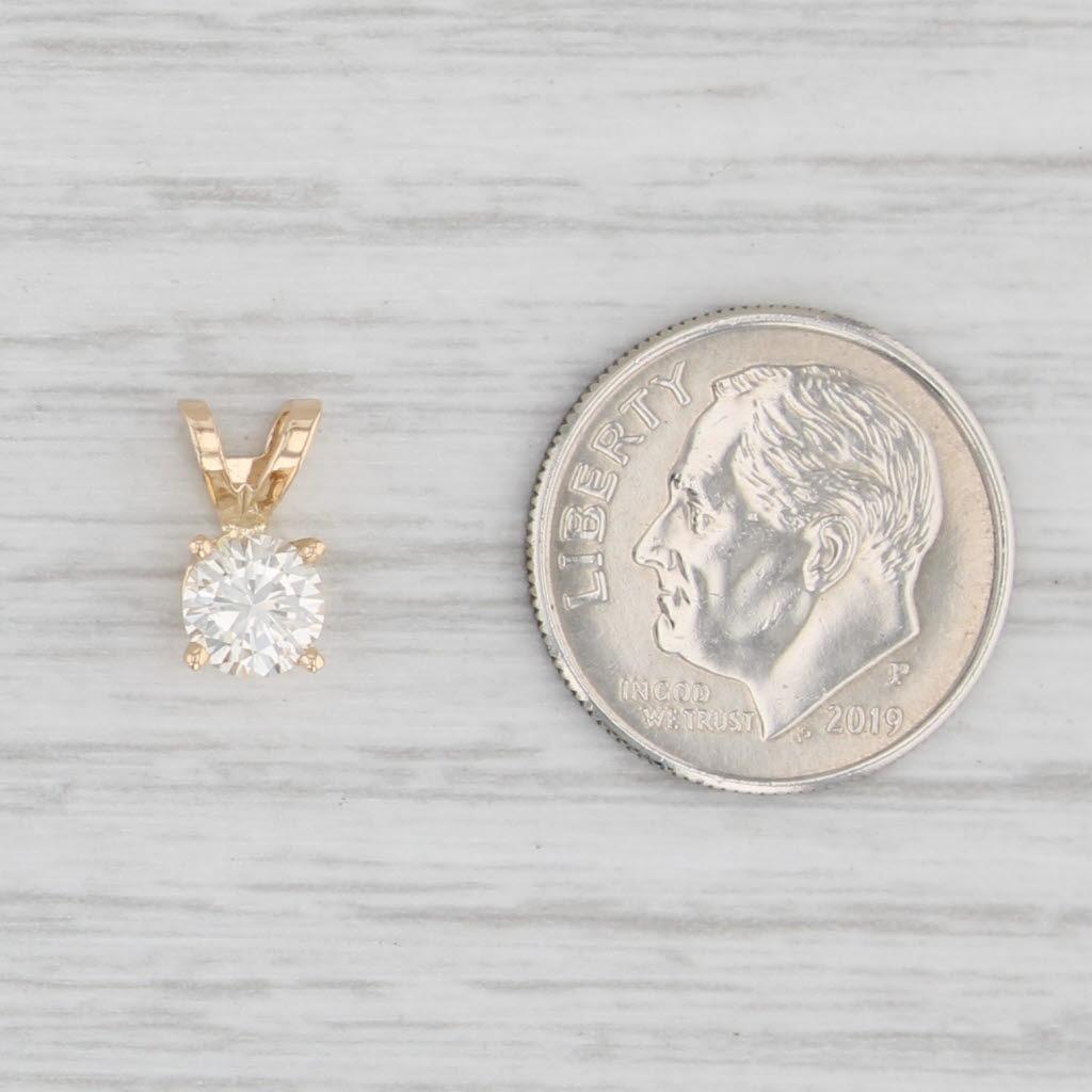 Pendentif solitaire rond en or jaune 14 carats avec diamant 0,54 carat Unisexe en vente