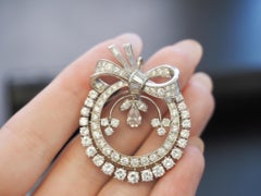 0.54ct Light Pink Platinum Diamond Bow Wreath Brooch