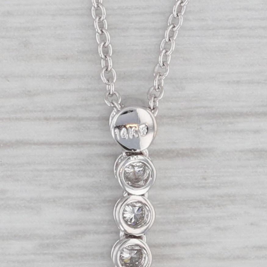 Gemstone Information:
- Natural Diamonds -
Total Carats - 0.54ctw
Cut - Round Brilliant
Color - F - H
Clarity - VS2 - SI1 

Metal: 14k White Gold 
Weight: 4 Grams 
Stamps: 14k
Chain Style: Cable Chain
Closure: Spring Ring Clasp
Length: 18