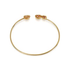 Pulsera abierta de oro amarillo de 18 quilates con turmalina rosa y zafiro naranja de 0,55 y 2,00 quilates