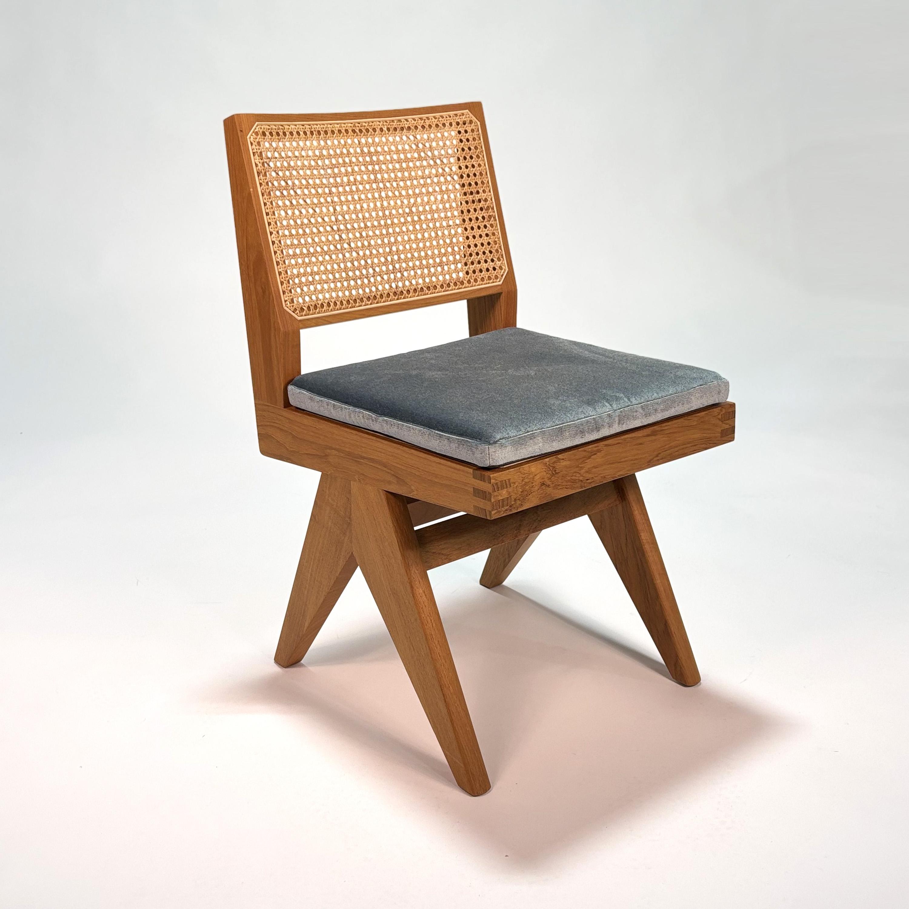 055 Capitol Complex Chair by Hommage a Pierre Jeanneret
Cassina
2019 / 2022

Burmese Teak with Woven Vienna straw seat and back. Seat cushion in Osaka fabric by Cassina.