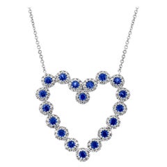 0.55 Carat Diamond and 0.79 Carat Blue Sapphire 14 Karat Gold Heart Necklace