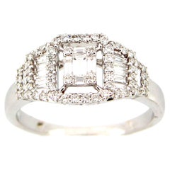 0.55 Carat Diamond Emerald Cut Cluster Ring