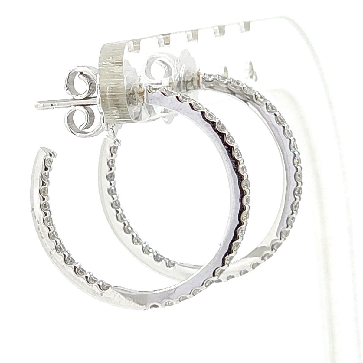 Women's 0.55 Carat Diamond Hoop Earrings in 14 Karat White Gold For Sale