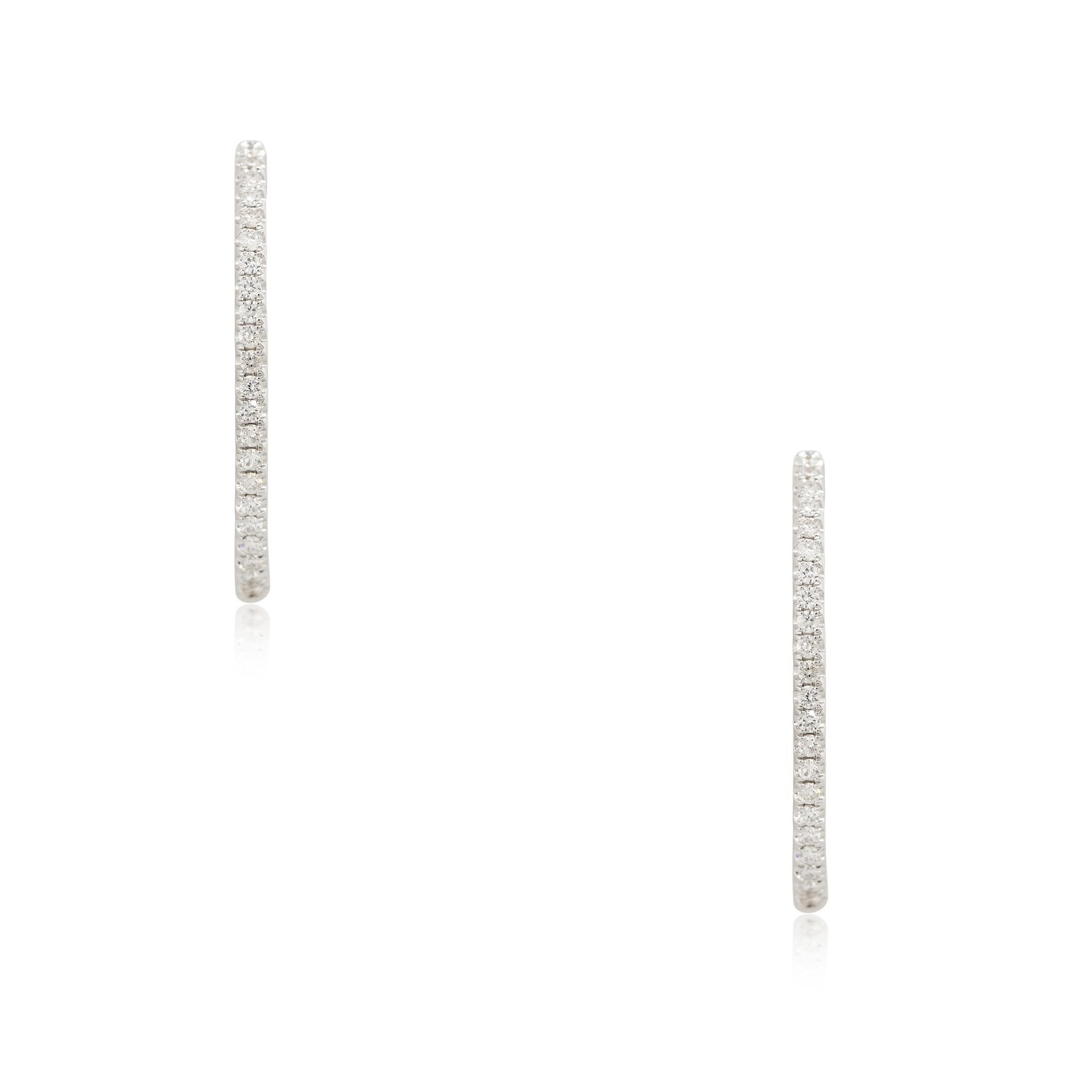 18k White Gold 0.55ctw Diamond Oval Hoop Earrings

Product: Oval Shaped Diamond Hoop Earrings
Material: 18k White Gold
Diamond Details: There are approximately 0.55 carats of Round Brilliant cut diamonds (44 stones)
Diamond Clarity: Diamonds are