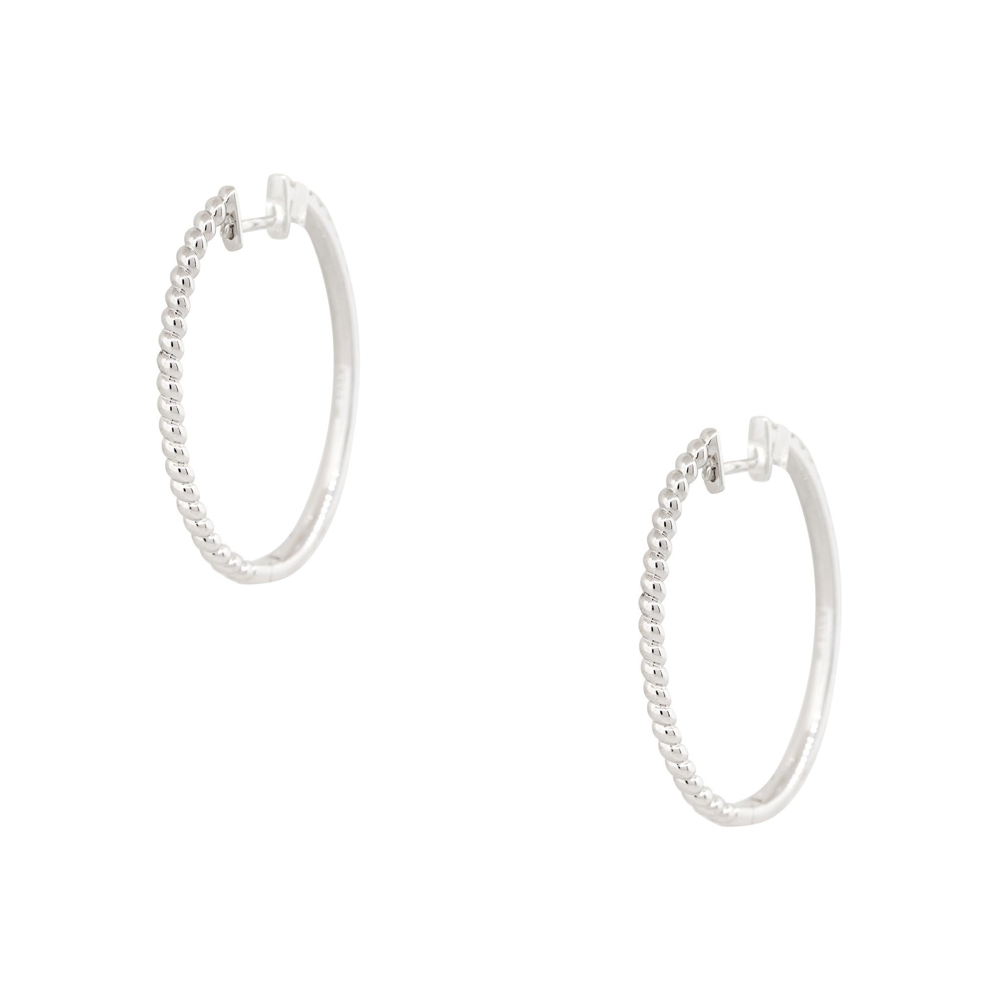 Women's 0.55 Carat Diamond Oval Hoop Earrings 18 Karat In Stock For Sale