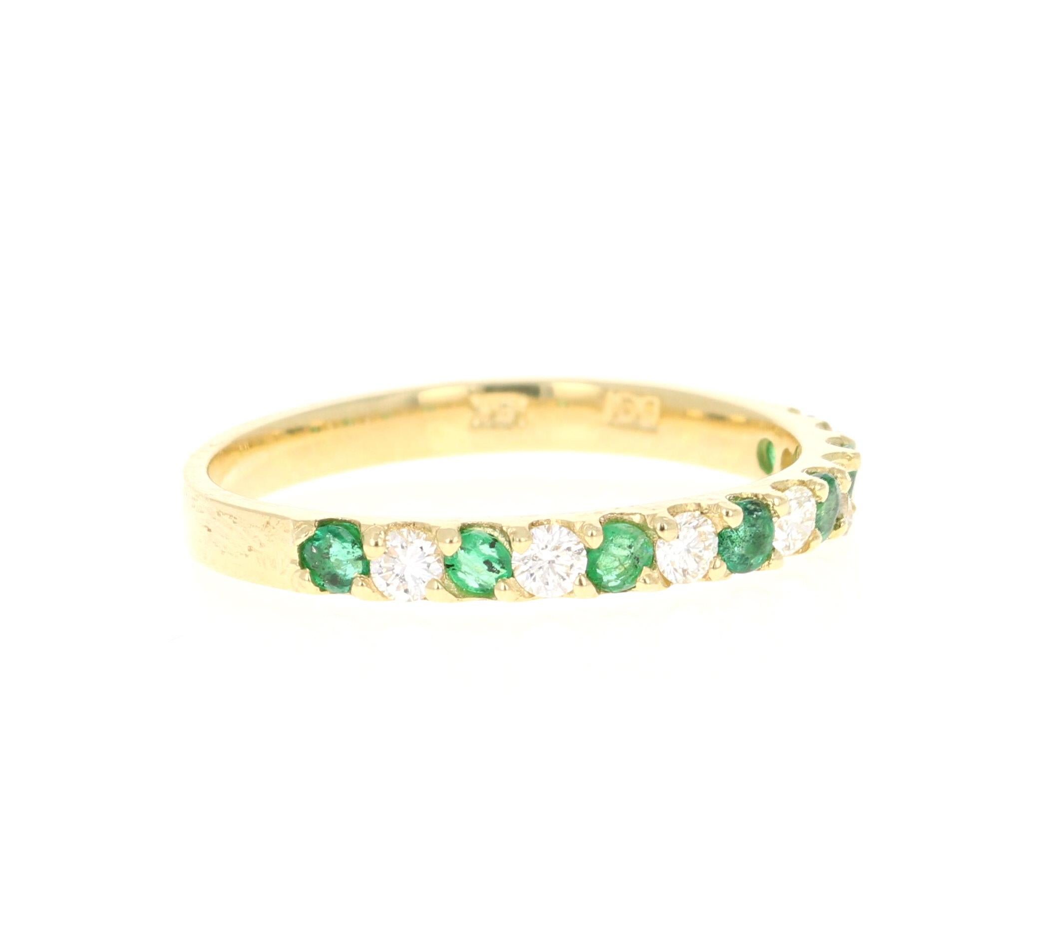 This is a classic Band that is a must-have!
It has 7 Emeralds that weigh 0.31 Carats and 8 Round Cut Diamonds that weigh 0.24 Carats. (Clarity: VS, Color: H) The Total Carat Weight of the Band is 0.55 Carats
It is made in 18K Yellow Gold and weighs