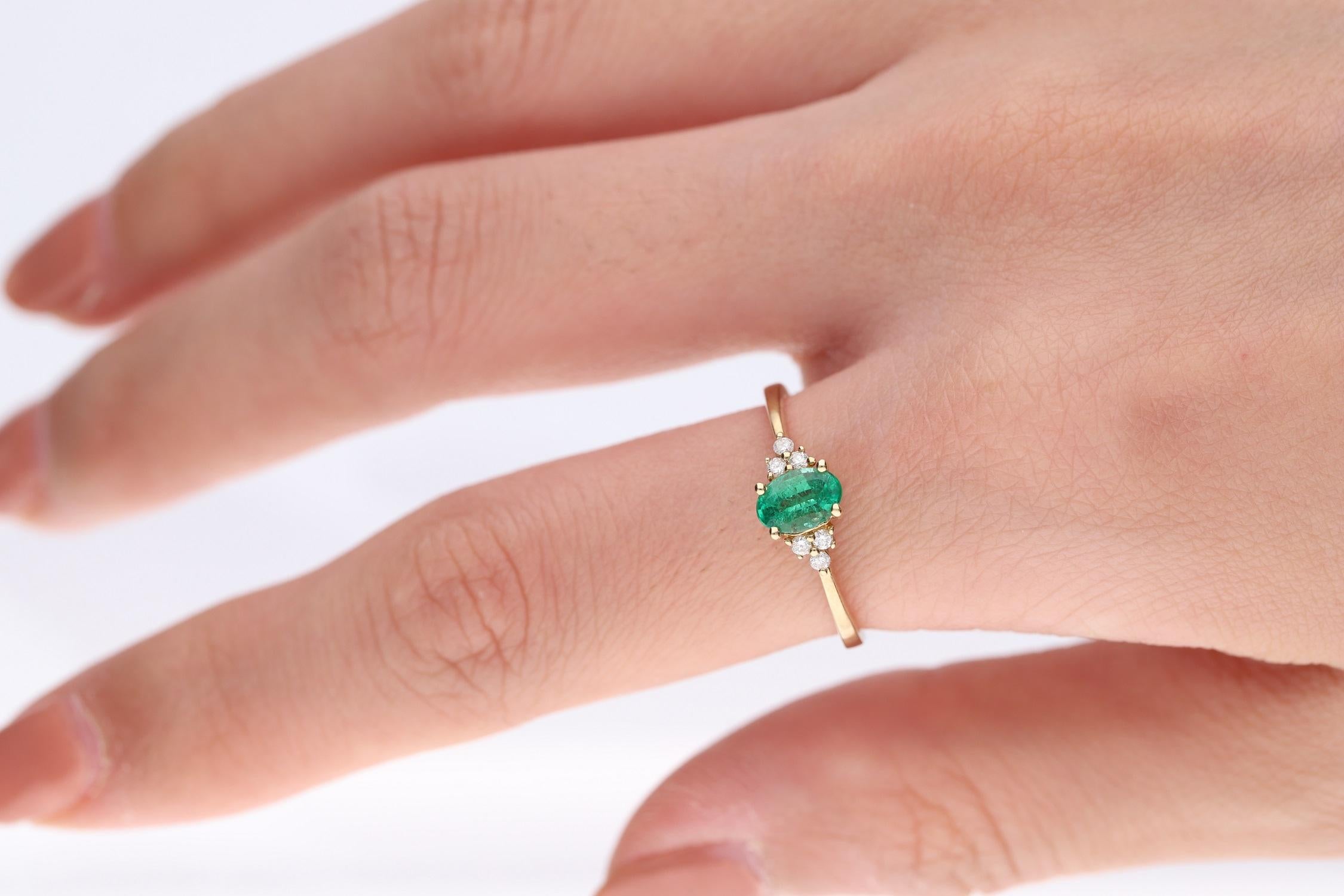 Stunning, timeless and classy eternity Unique ring. Decorate yourself in luxury with this Gin & Grace ring. The 10k Yellow Gold jewelry boasts 4X6 Oval-Cut Prong Setting Natural Emerald (1pcs) 0.55 Carat and Round-Cut Prong Setting Natural Diamond