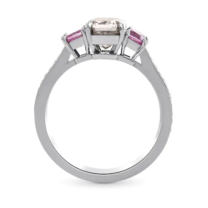 0.55 carat Fancy White Diamond Square cut, two pink Sapphires and Diamond on White Gold 18K Ring.
Size upon request.