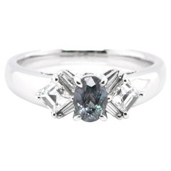 0.55 Carat Natural Color-Changing Alexandrite and Diamond Ring Set in Platinum