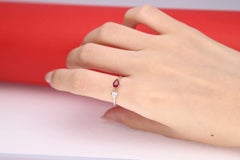 0.55 Carat Pear-Cut Ruby with Diamond Accents 18K White Gold Ring
