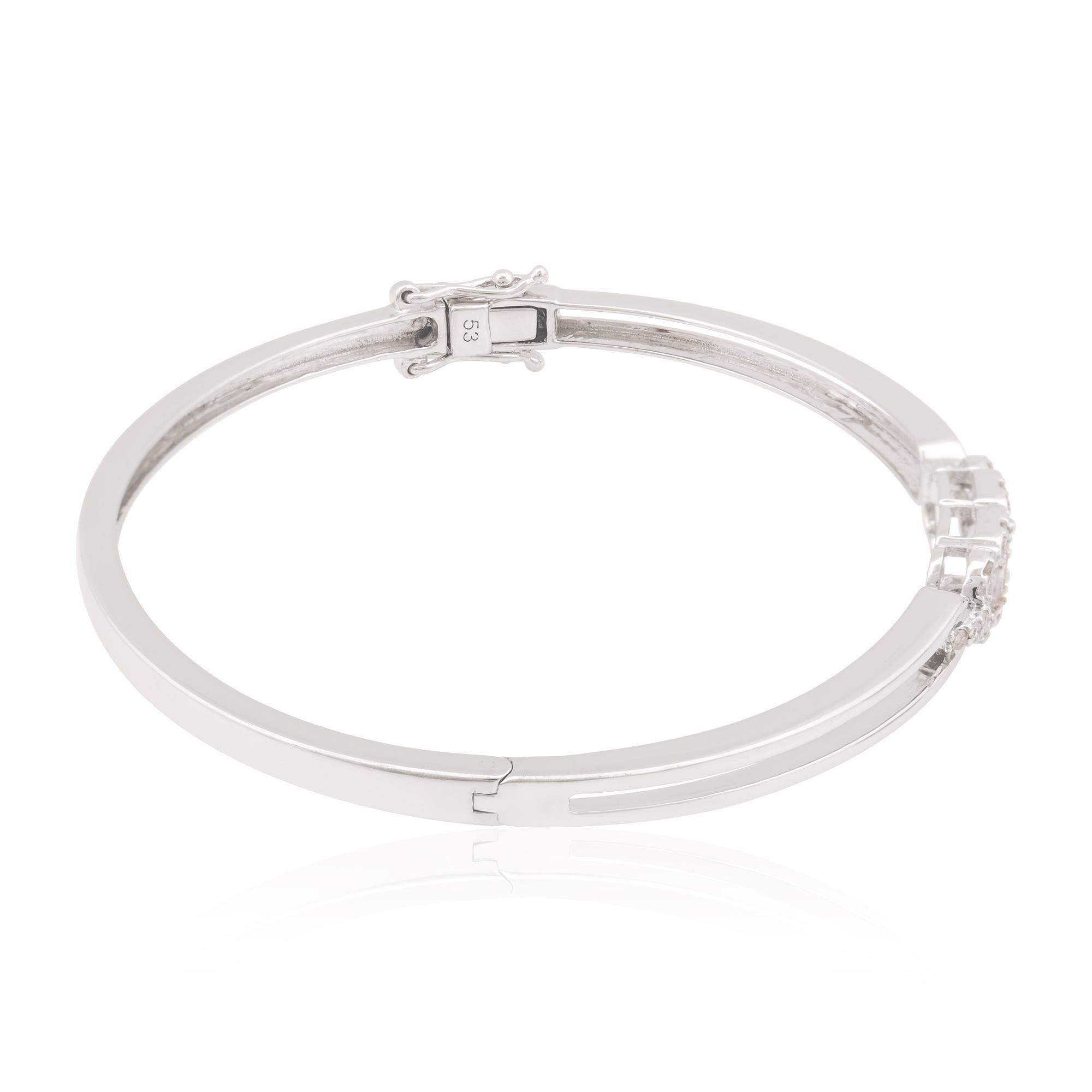 This baguette diamond bracelet is the perfect accessory for both formal and casual occasions. It effortlessly elevates any outfit, adding a touch of sparkle and refinement. It is a symbol of elegance and luxury, a piece that will be treasured for