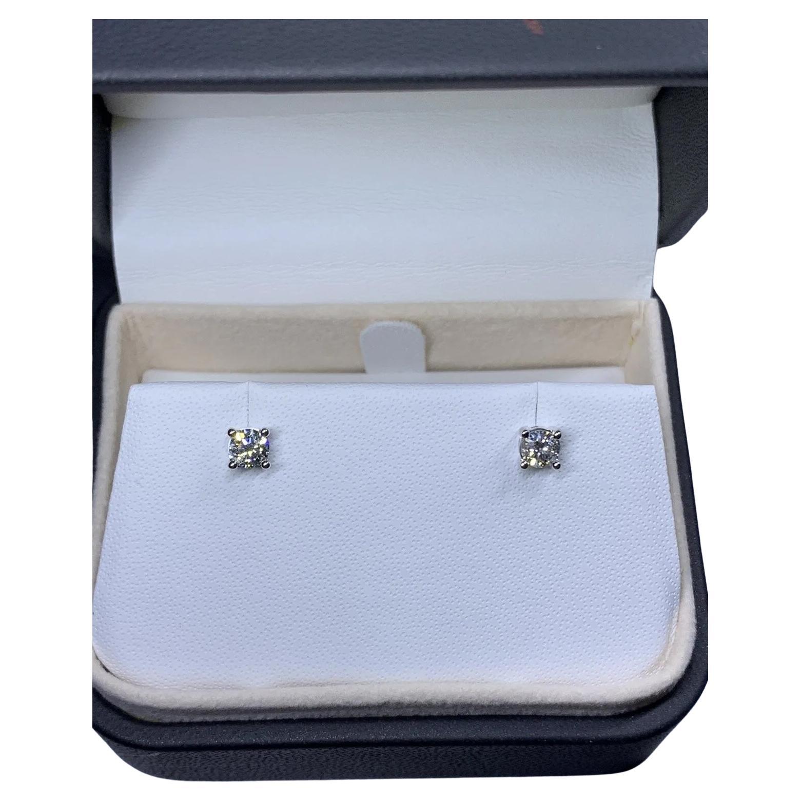 0.55ct Diamond Solitaire Stud Earrings In 18ct White Gold F-VS1