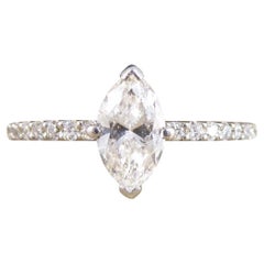 0.55ct Marquise Cut Diamond Solitaire Engagement Ring with Diamond Shoulders in