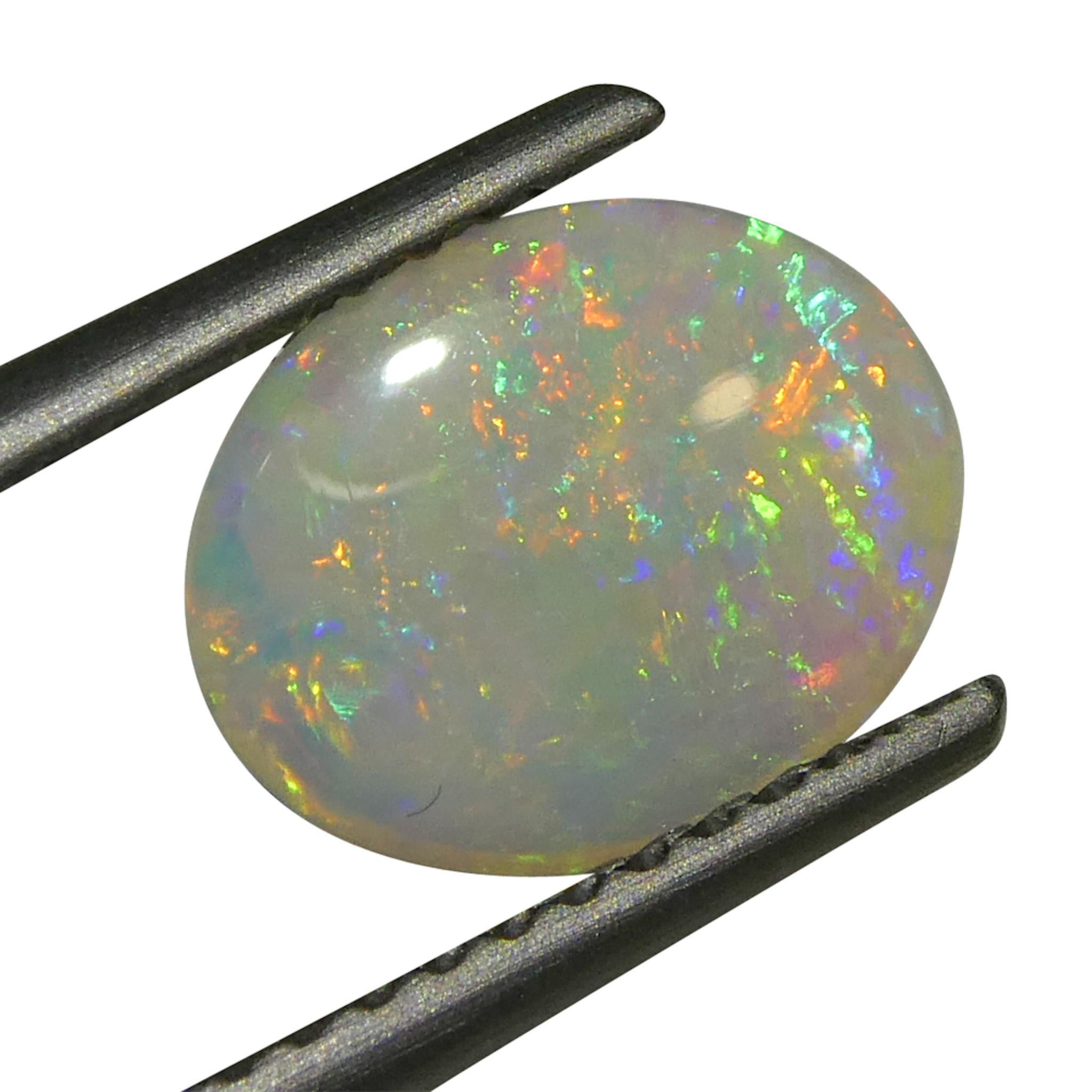 0.55 Karat ovaler weißer Opal mit Cabochonschliff aus Australien im Angebot 5