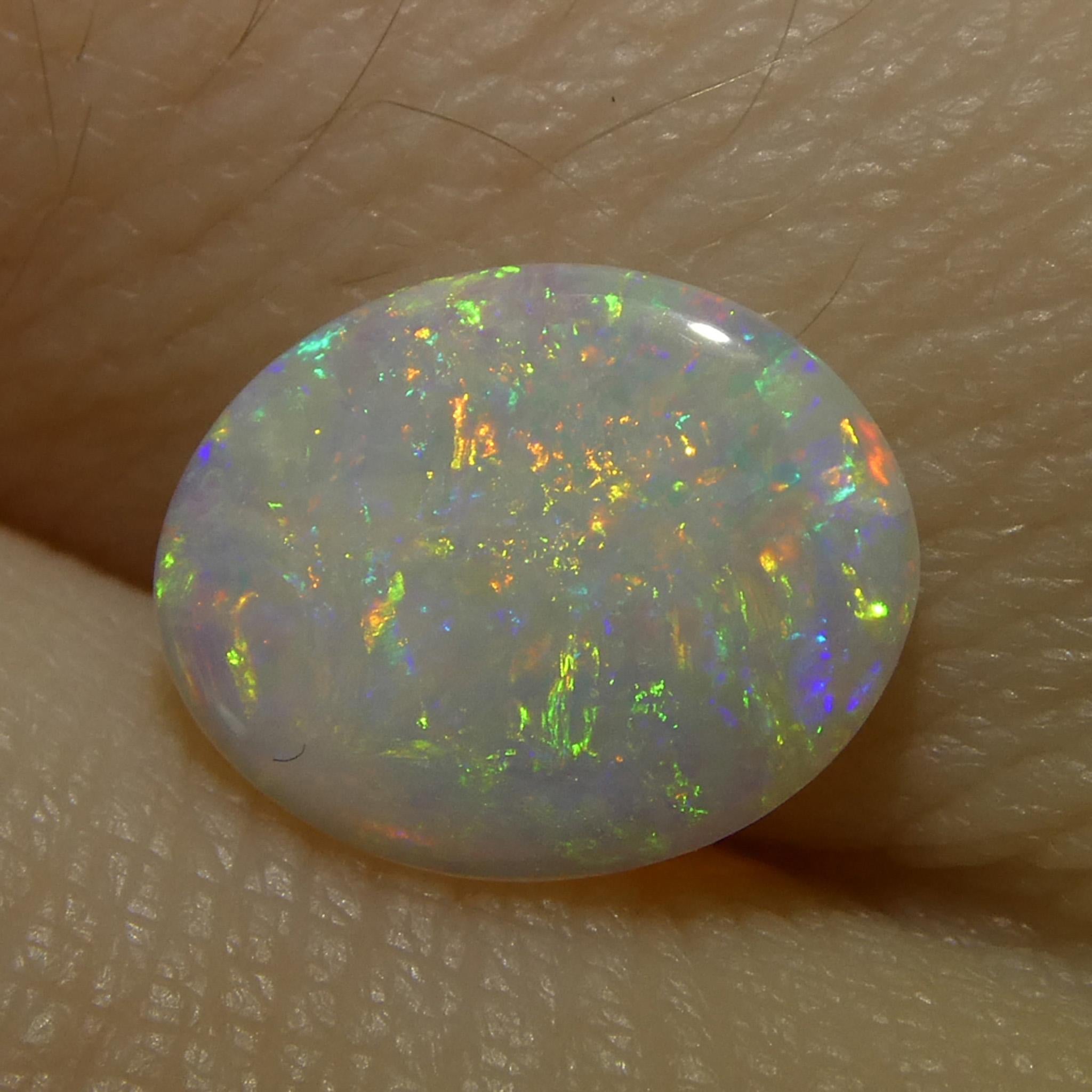 0.55 Karat ovaler weißer Opal mit Cabochonschliff aus Australien im Angebot 6