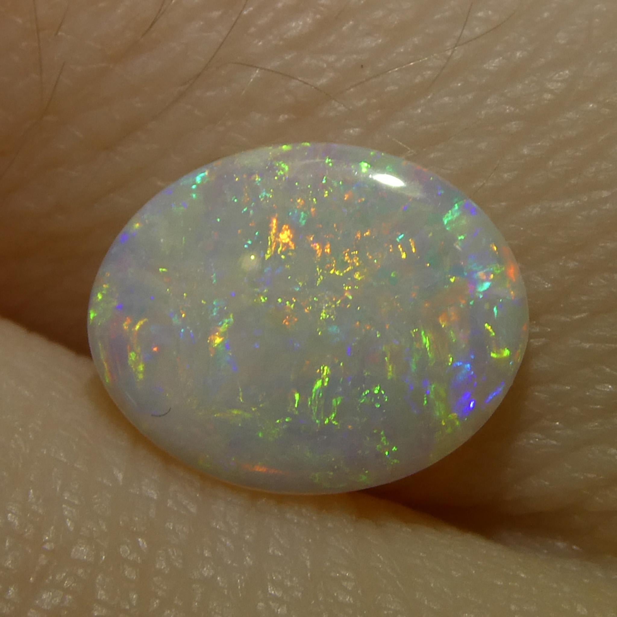 0.55 Karat ovaler weißer Opal mit Cabochonschliff aus Australien im Angebot 7