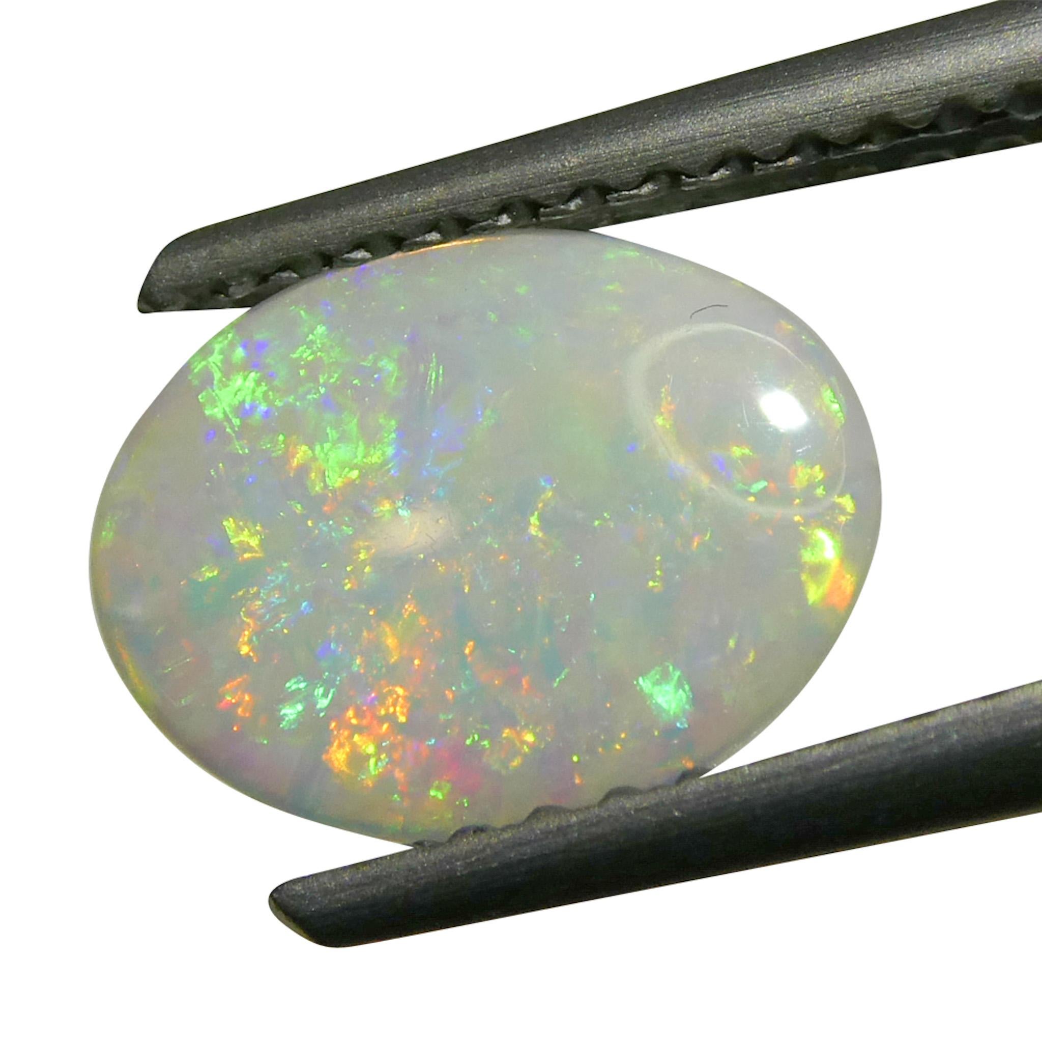 0.55 Karat ovaler weißer Opal mit Cabochonschliff aus Australien im Angebot 4