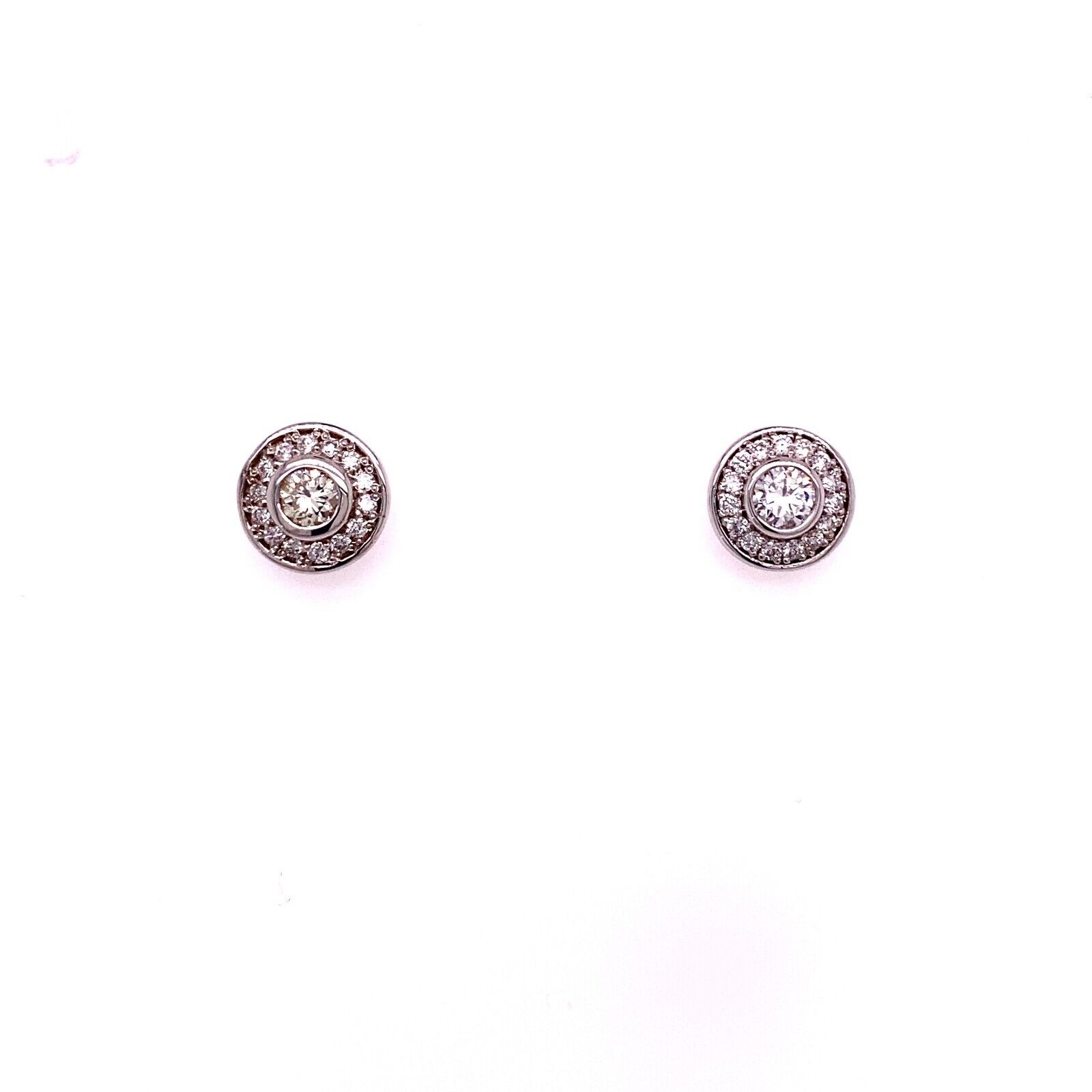 Modern 0.55ct Round Brilliant Cut Diamond Halo Earrings in 18ct White Gold For Sale