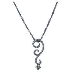 0.55ct Round diamond solitaire pendant necklace in 18ct white gold.