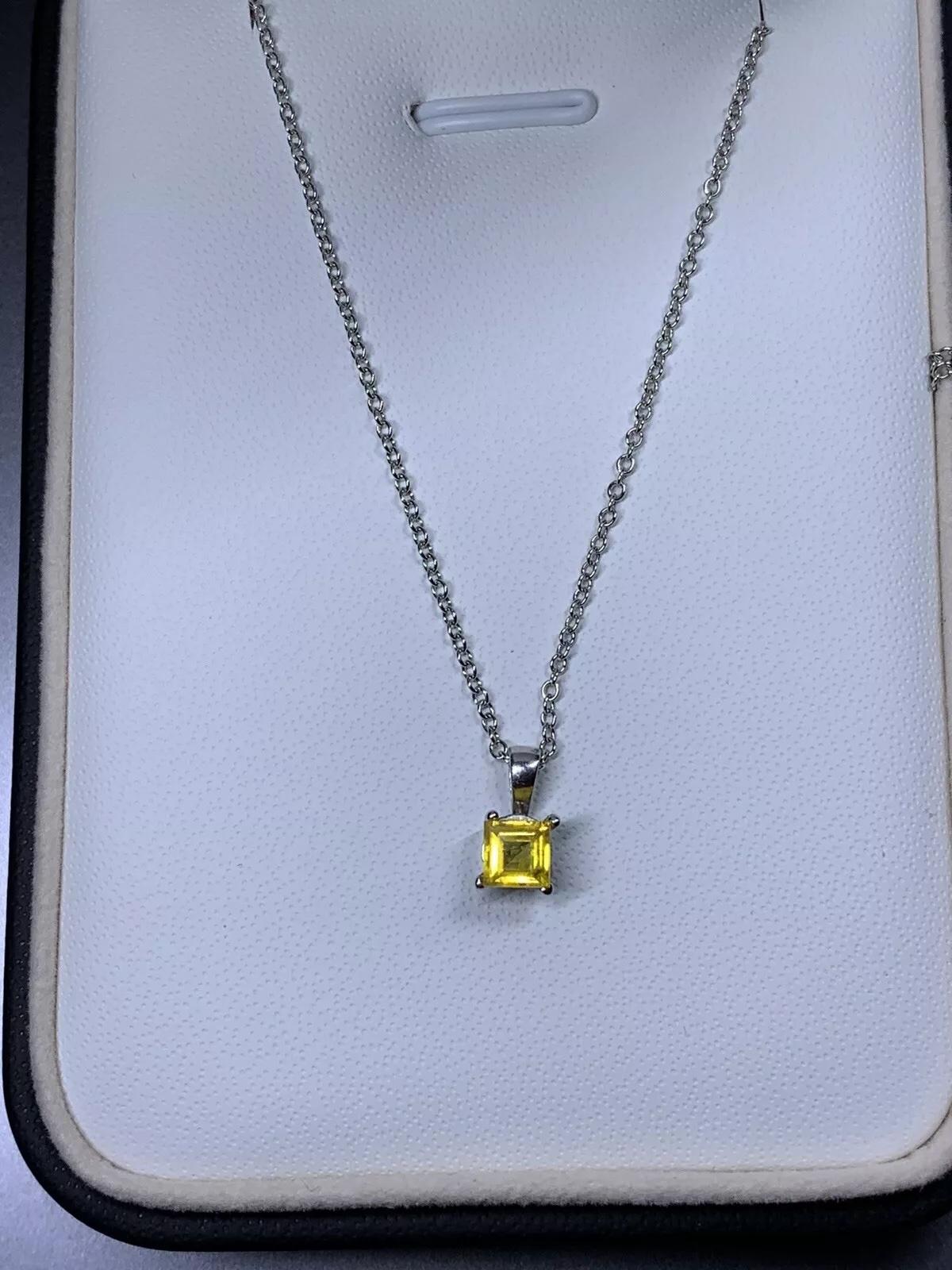 Princess Cut 0.55ct Yellow sapphire pendant in 18ct white gold. For Sale