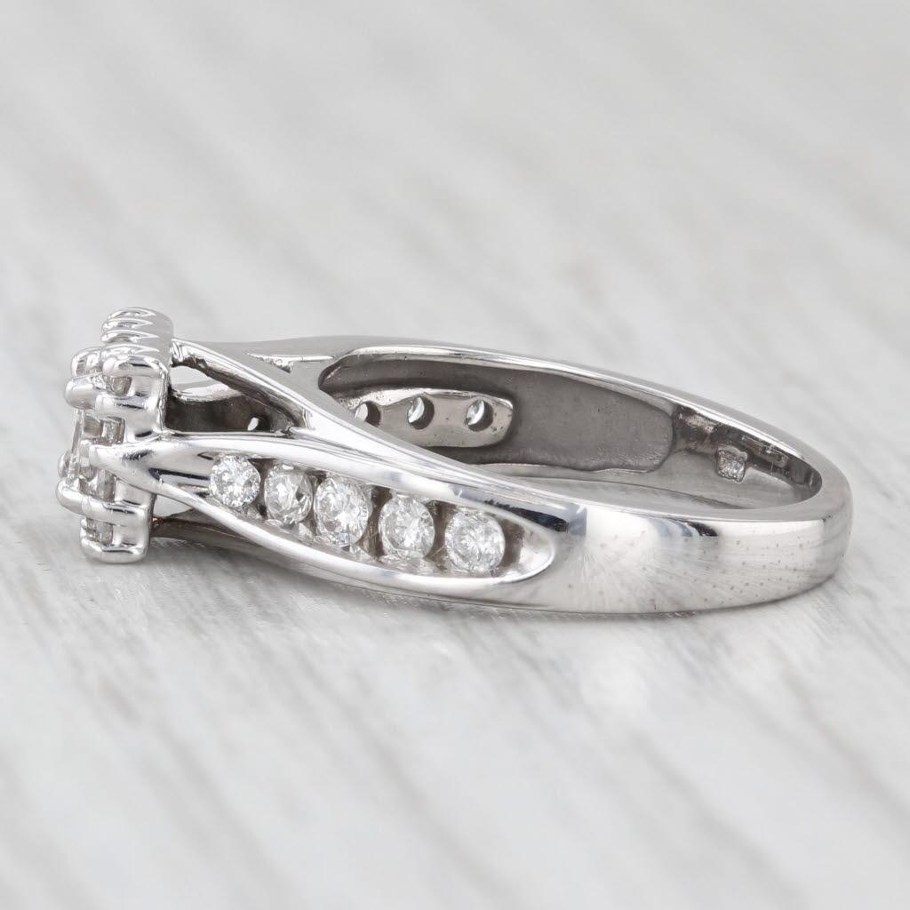 da uomo o donna Anello di fidanzamento a forma di aureola con diamante da 0,55 ct. in oro bianco 14k, misura 5,5, fascia da cattedrale in vendita