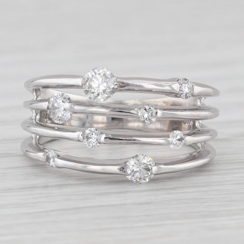 Gemstone Information:
- Natural Diamonds -
Total Carats - 0.55ctw
Cut - Round Brilliant
Color - H - J
Clarity - I1 

- Natural Diamonds -
Total Carats - 0.40ctw
Cut - Round Brilliant
Color - I - K
Clarity - SI2 - I1

Metal: 14k White Gold
Weight: