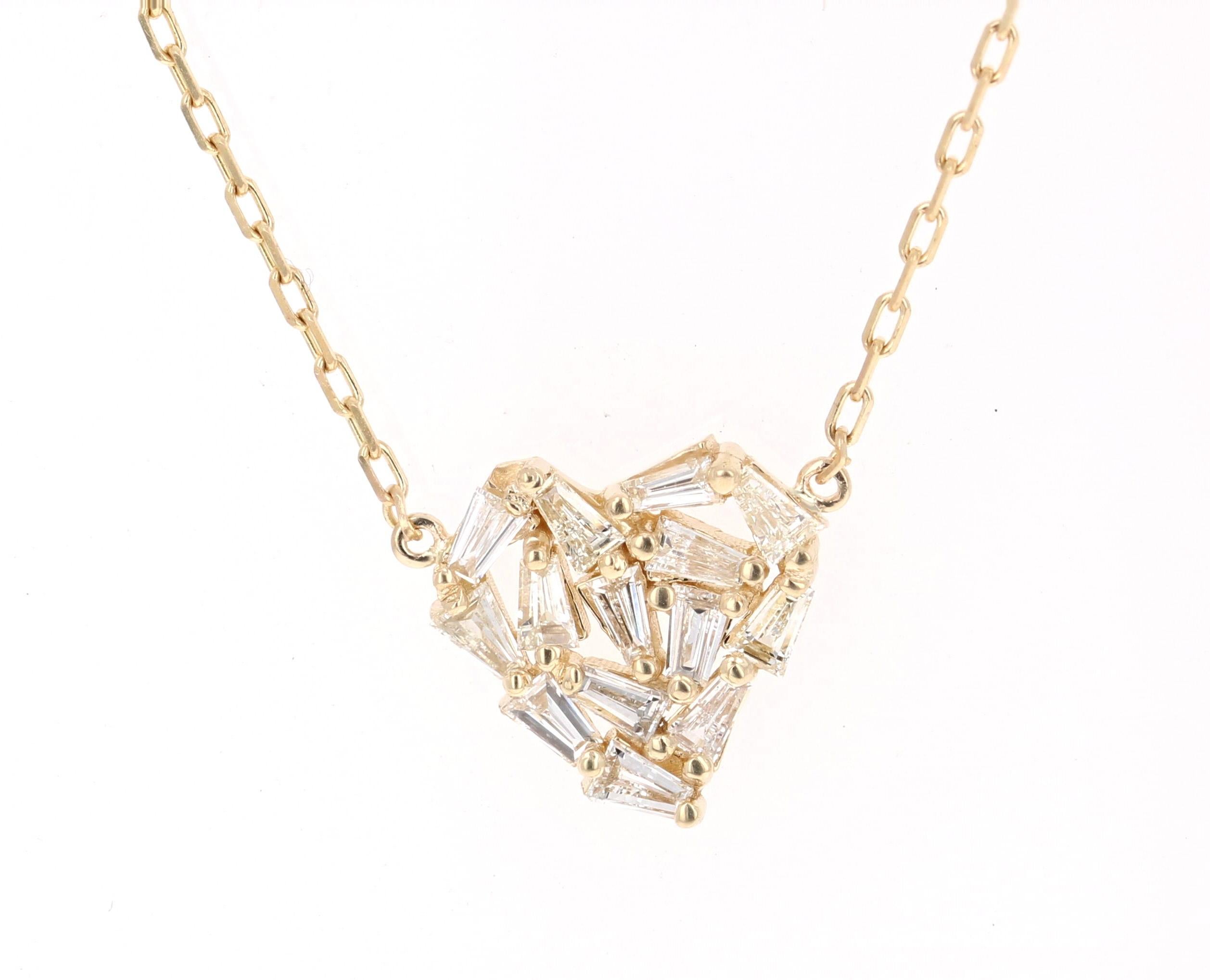 Cute, dainty Necklace that is sure to make a big statement!
0.56 Carat Baguette Diamond 14 Karat Yellow Gold Chain Pendant!

The 14 Baguette Cut Diamonds that weigh 0.56 Carats (Clarity: VS, Color: I) are carefully set to create a Heart Design