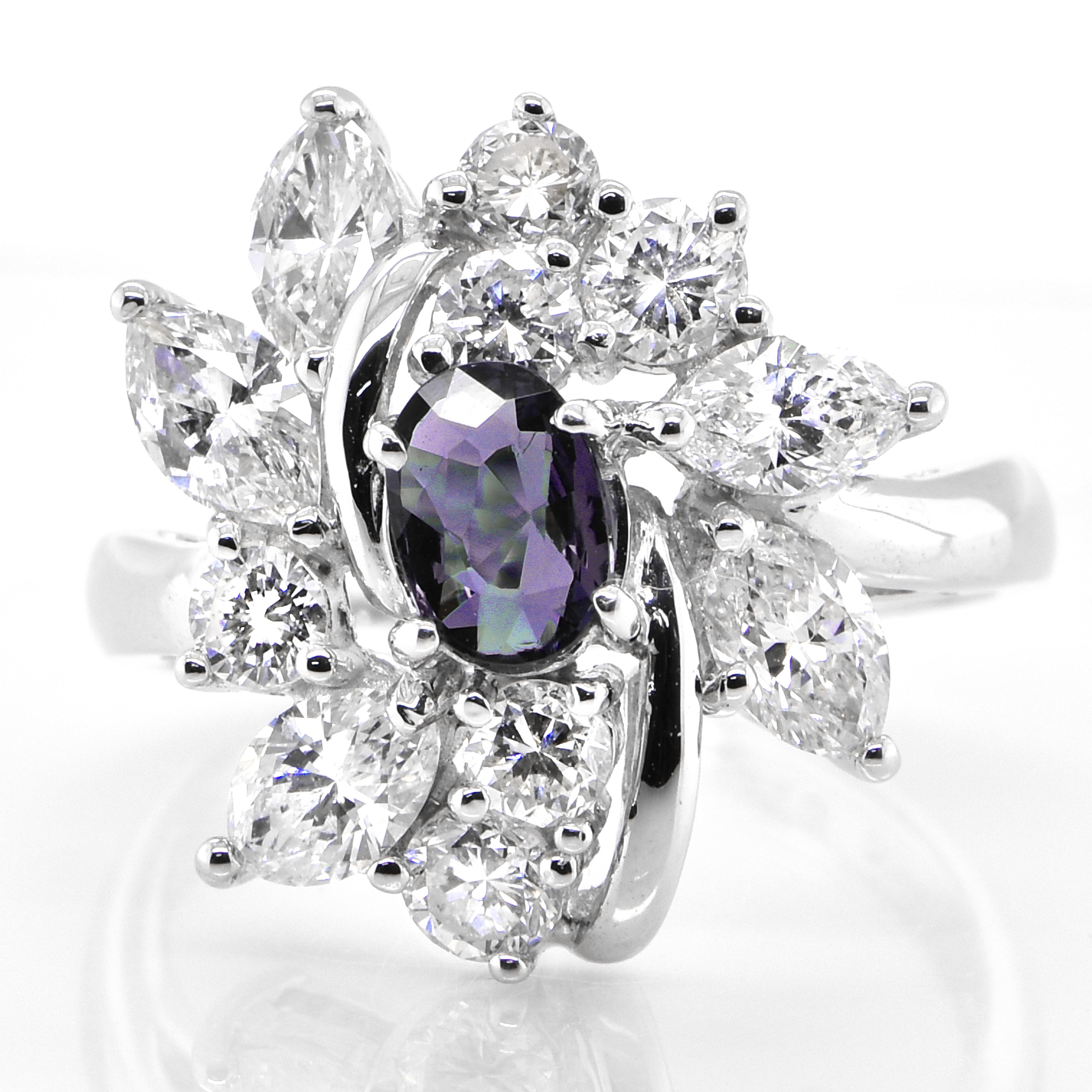 A gorgeous ring featuring 0.566 Carat, Natural Alexandrite and 1.96 Carats of Diamond Accents set in Platinum. Alexandrites produce a natural color-change phenomenon as they exhibit a Bluish Green Color under Fluorescent Light whereas a Purplish Red