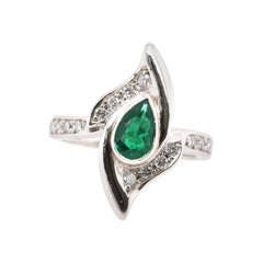 0.56 Carat Natural Emerald and Diamond Fashion Ring Set in Platinum