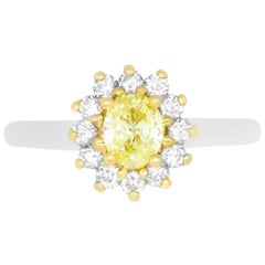 0.56 Carat Oval Yellow Diamond Engagement Ring