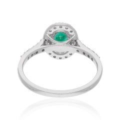 Bague en or blanc 18 carats avec émeraude de Zambie ovale de 0,56 carat et diamants de 0,35 carat