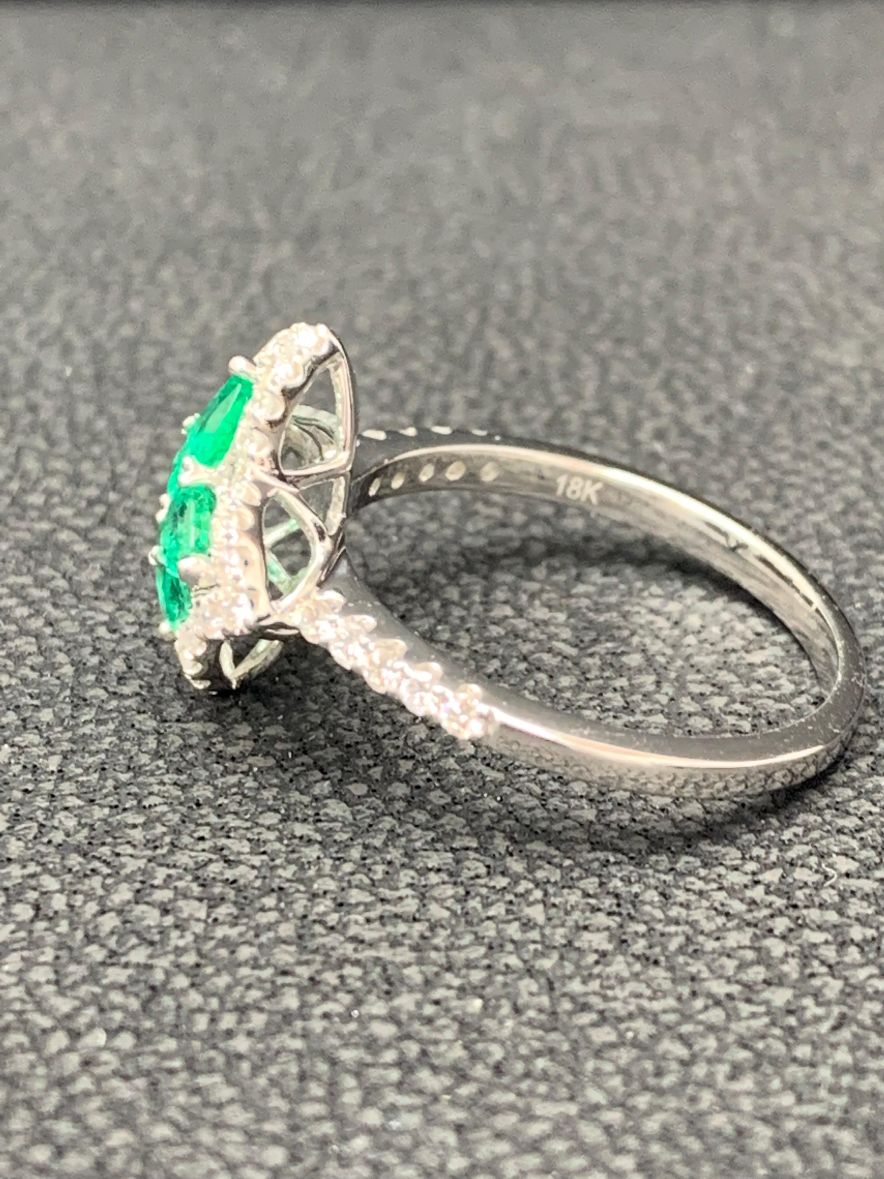 0.56 Carat Pear Shape Emerald and Diamond Cocktail Ring in 18K White Gold In New Condition For Sale In NEW YORK, NY