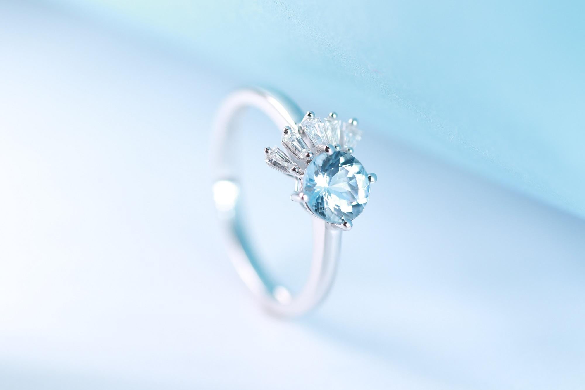 Stunning, timeless and classy eternity Unique Ring. Decorate yourself in luxury with this Gin & Grace Ring. The 18k White Gold jewelry boasts Round cut Prong Setting Genuine Aquamarine (1 pcs) 0.56 Carat, along with Natural Baguette cut white