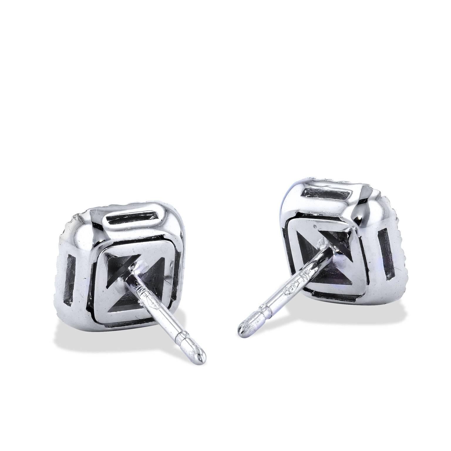 Italian designer 18 karat white gold square-shaped pave diamond stud earrings featuring a pave diamond halo with a total weight of 0.56 carat (G/VS).