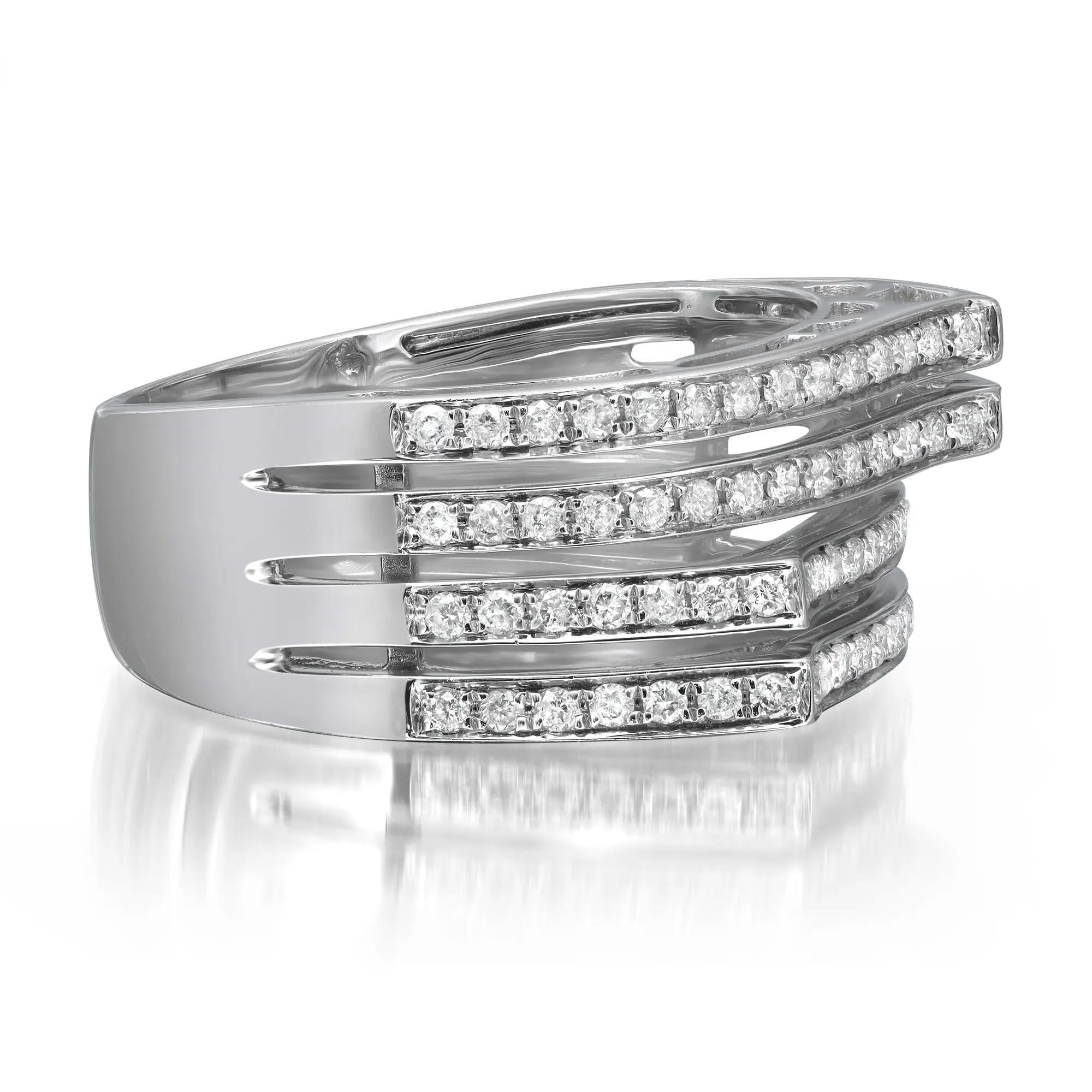 This elegant and classic diamond band ring is crafted in 14k white. Features four rows of pave set round brilliant cut diamonds weighing 0.56 carat. Ring width: 9.4mm. Ring size: 7.5. Total weight: 5.11 grams. Perfect addition to your jewelry
