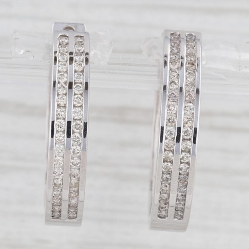Gemstone Information:
- Natural Diamonds -
Total Carats - 0.56ctw
Cut - Round Brilliant
Color - J - L
Clarity - SI2 - I1
Please note there are surface reaching inclusions.

Metal: 14k White Gold
Weight: 6.7 Grams 
Stamps: 14k
Closure: Hinged with