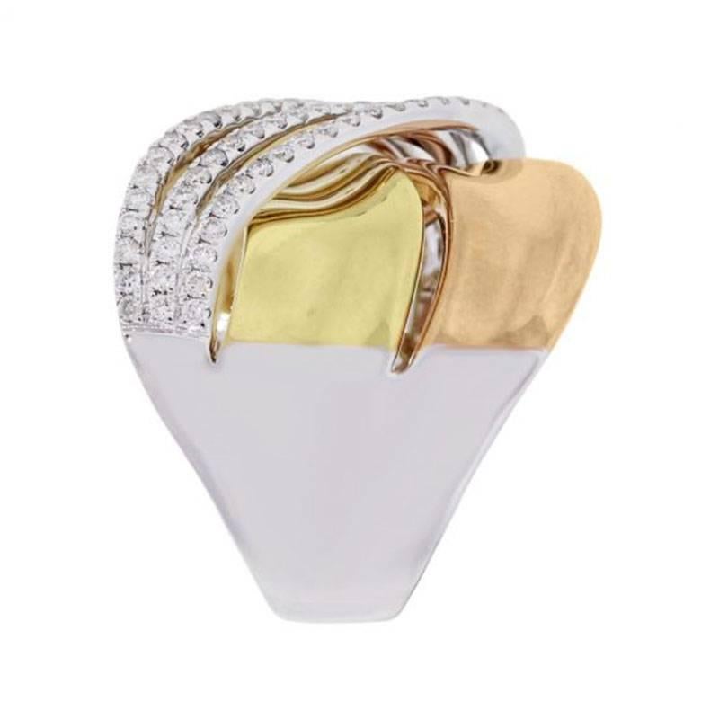 Material: 18k white, yellow and rose gold
Diamond Details: Approximately 0.57ctw of round brilliant diamonds. Diamonds are G/H in color and VS in clarity
Measurements: 0.86″ x  0.75″ x 0.75″
Weight: 9.5g (6.1dwt)
Ring Size: 7 (can be sized)
SKU: