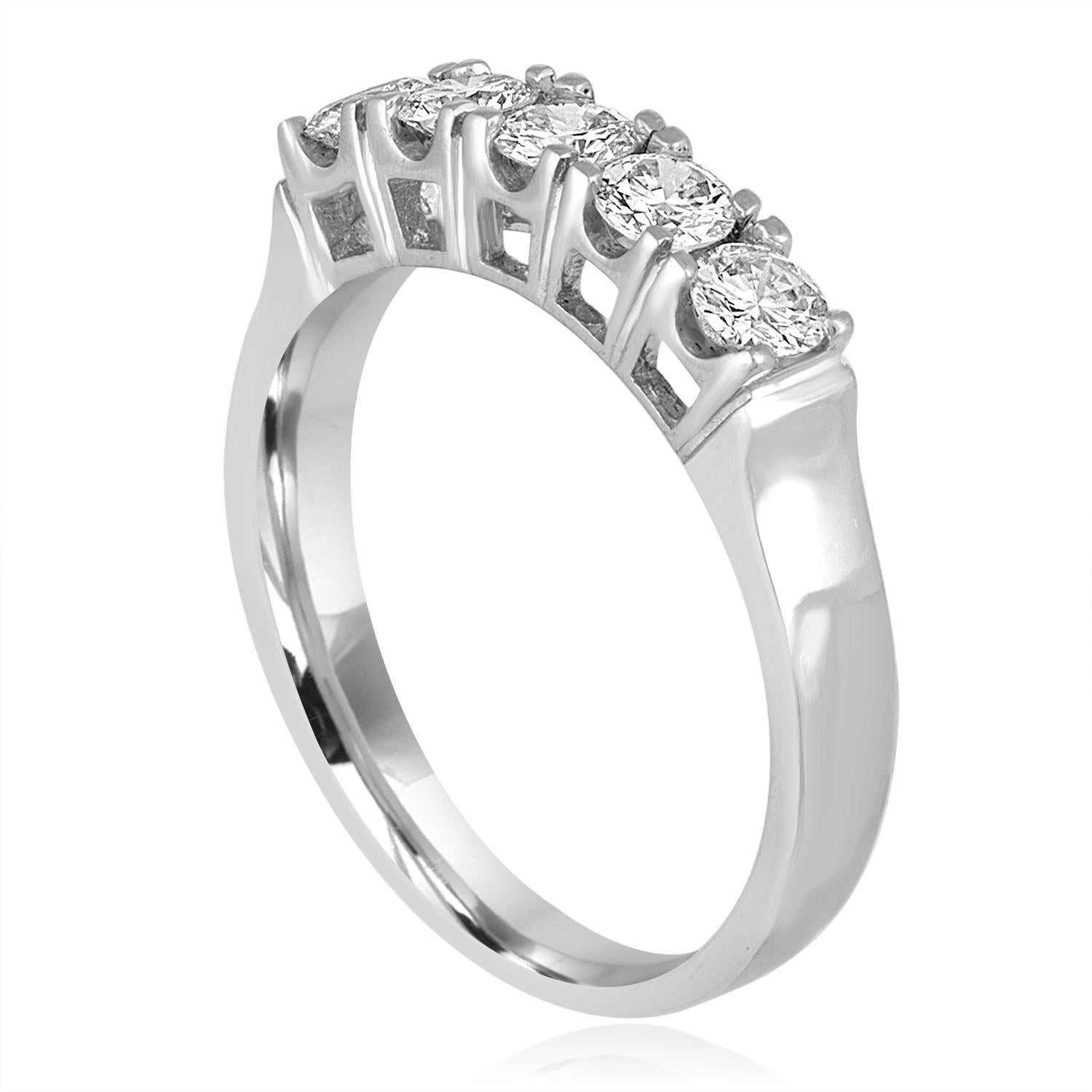 Very Beautiful Half Diamond Band Ring
The ring is 14K White Gold
There are 5 Round Cut Diamonds prong set
There are 0.57 Carats In Diamonds G/H VS
The ring is a size 6.25, sizable. 
The band is 3.53 mm wide and tapers down to 2.54mm.
The ring weighs